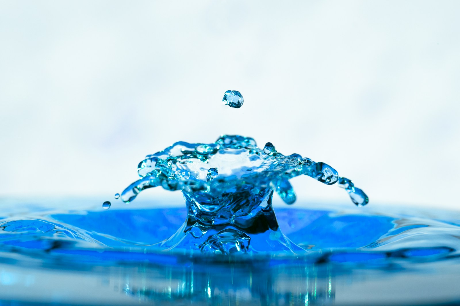 water drop on water in time lapse photography